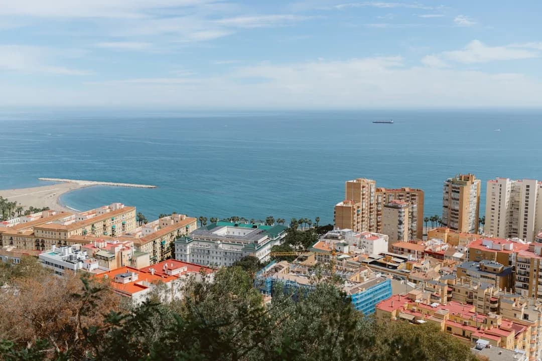 Malaga city street apartment cost living